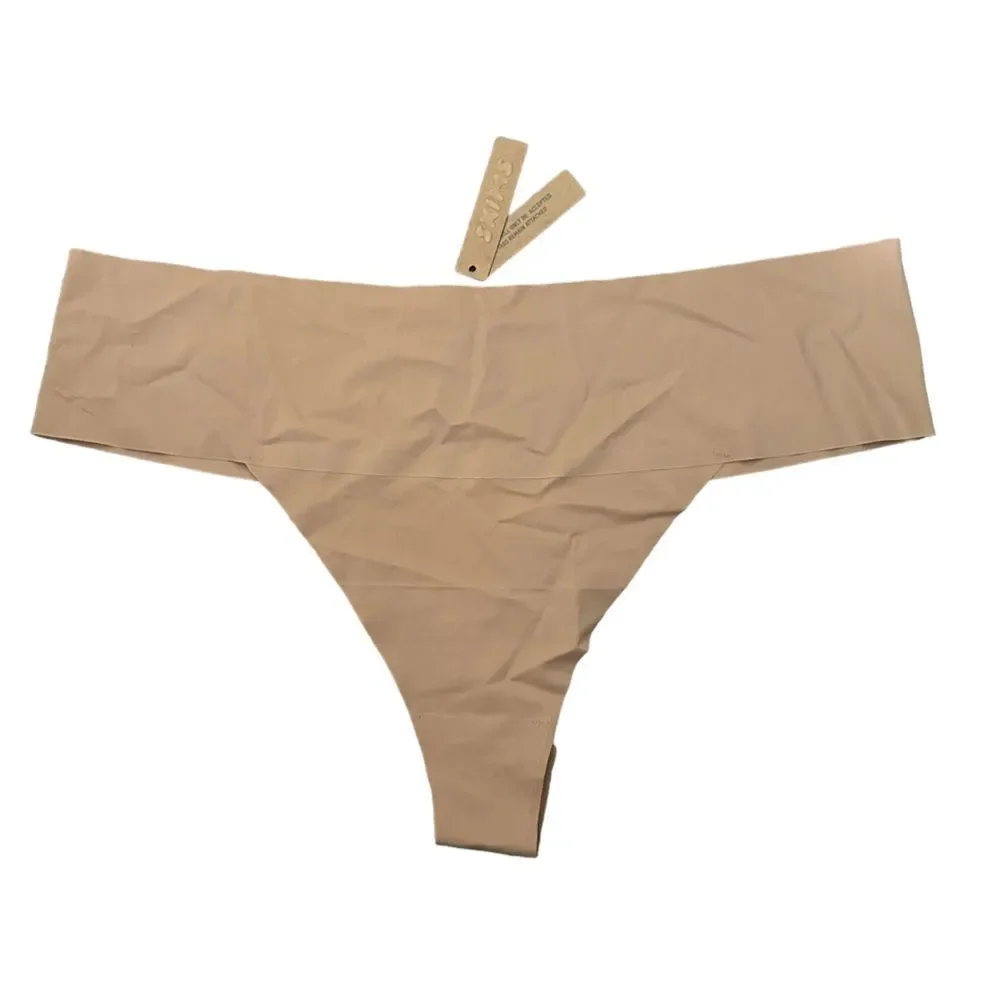 NWT SKIMS Naked Dipped Seamless Thong In Nude Ochre Panty